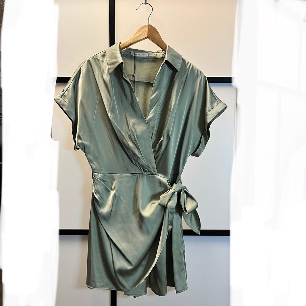 Green romper.